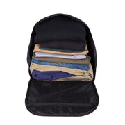 Interior del morral abierto mostrando capacidad para ropa organizada - Citybags