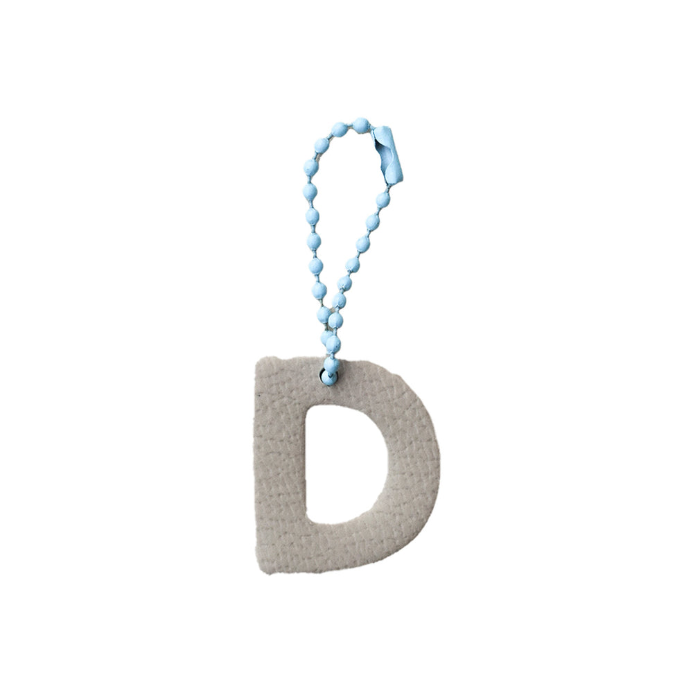 Charm Letra redonda D Latte