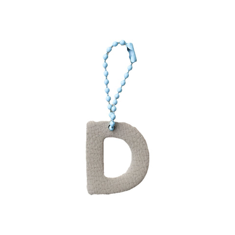 Charm Letra redonda D Latte