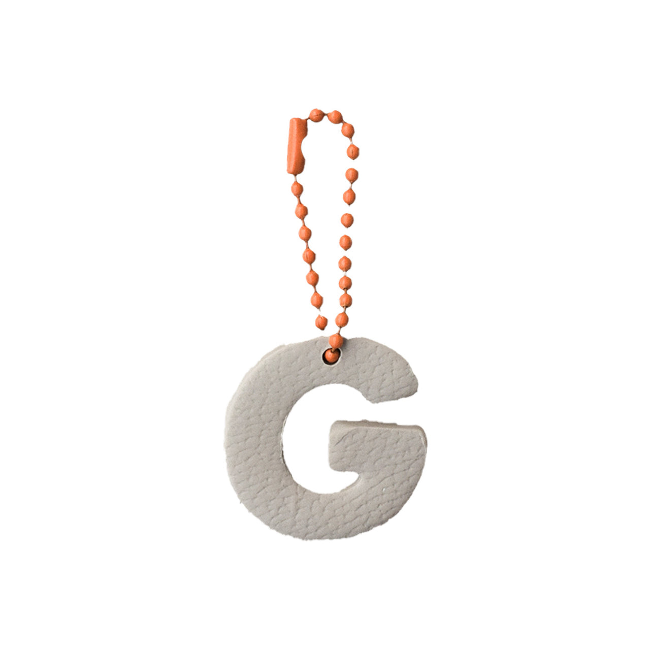 Charm Letra redonda G Latte